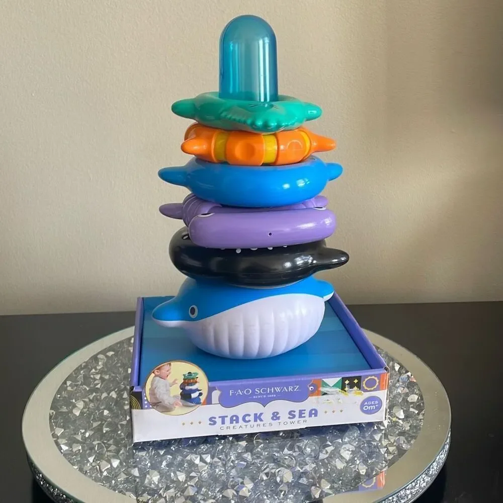 Preowned cute FAO Schwartz stack & sea creature tower 0 month unisex baby toys